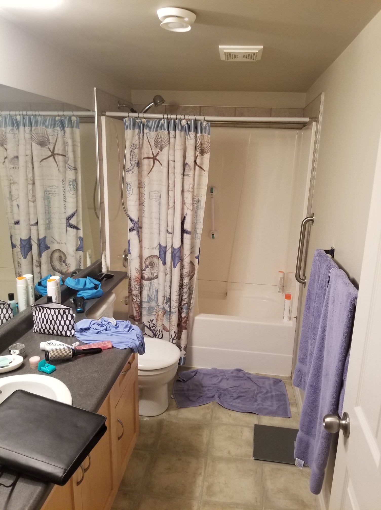 The old bathroom had a standard tub that was not accessible to an aging in place lifestyle. Additional challenges around storage that were address in the renovation.